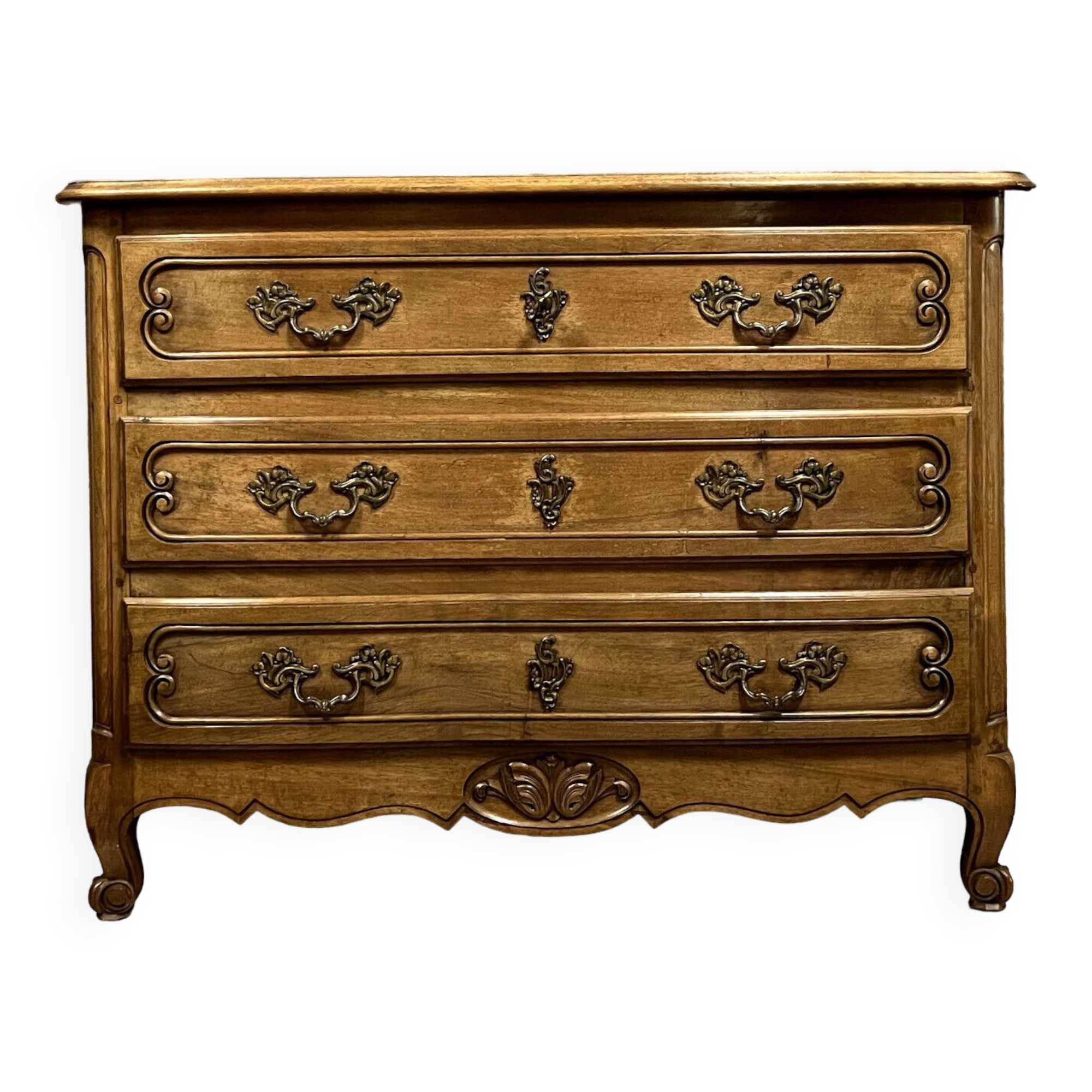 Curved Louis XV style chest of drawers in solid wood with a light patina