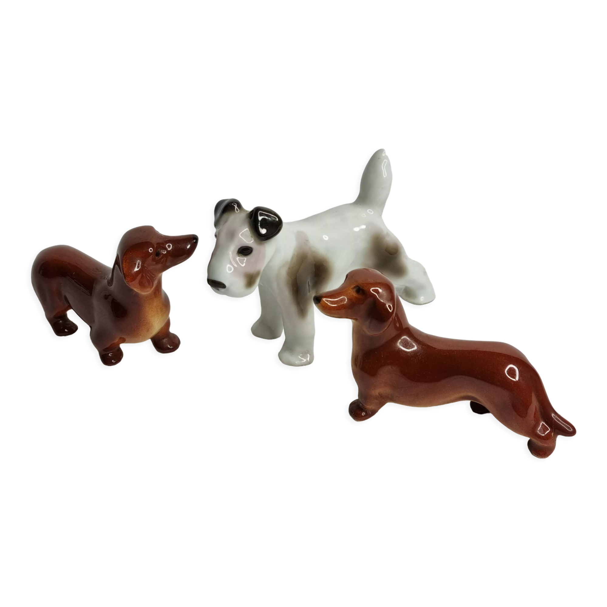 Set of three porcelain puppies