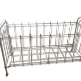 Old bed in wrought iron and brass balls