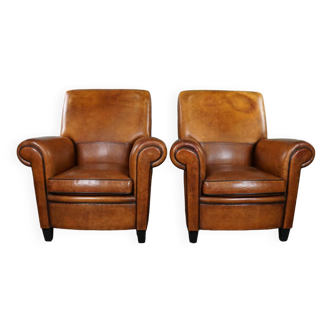 Set of two large and comfortable sheep leather armchairs