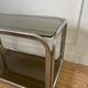 Rolling serving cart in chromed steel and smoked glass, 70s design