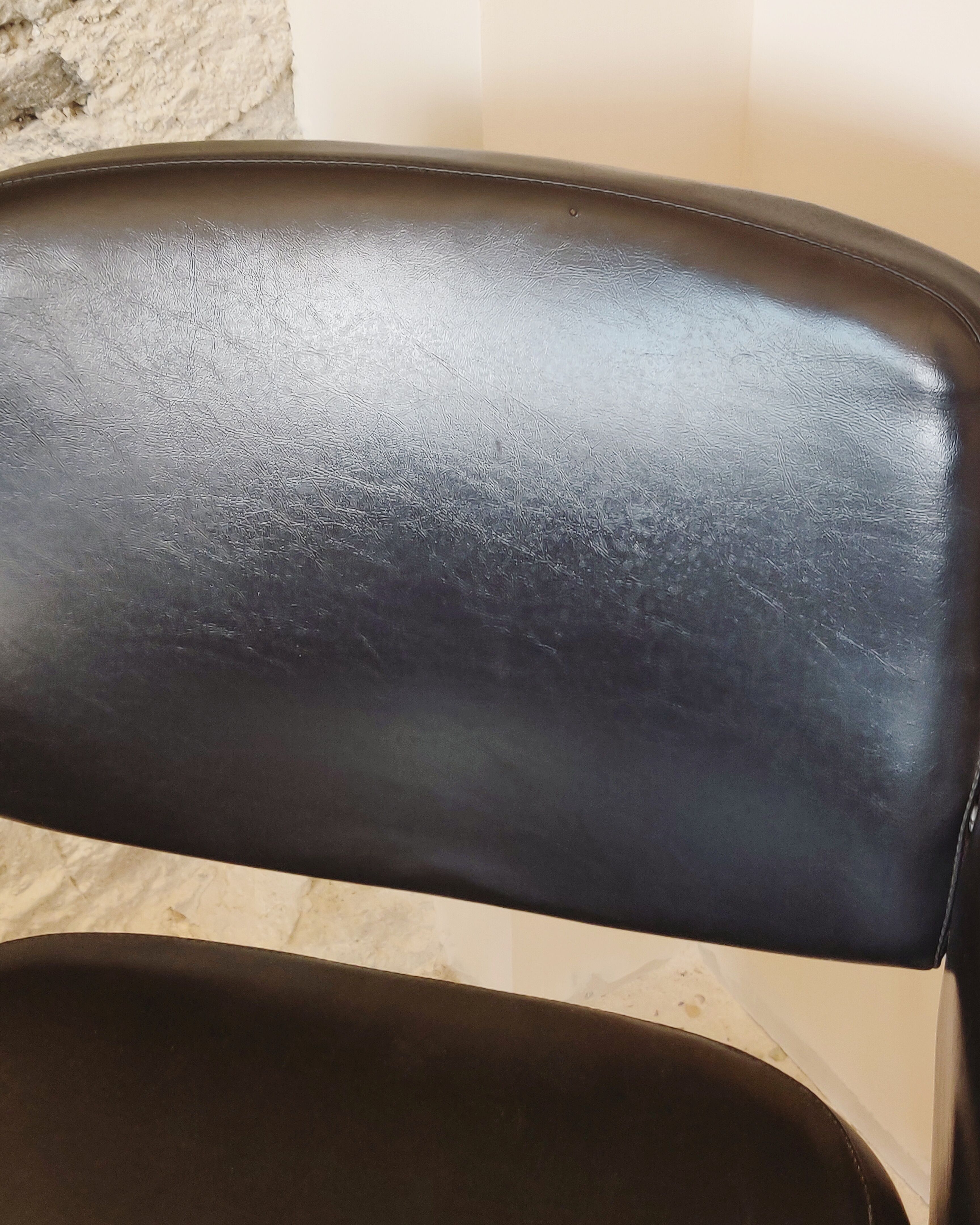 Black vintage conference chair, chrome feet