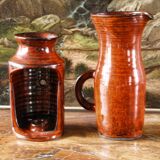 Signed orange ceramic candle holder and jug