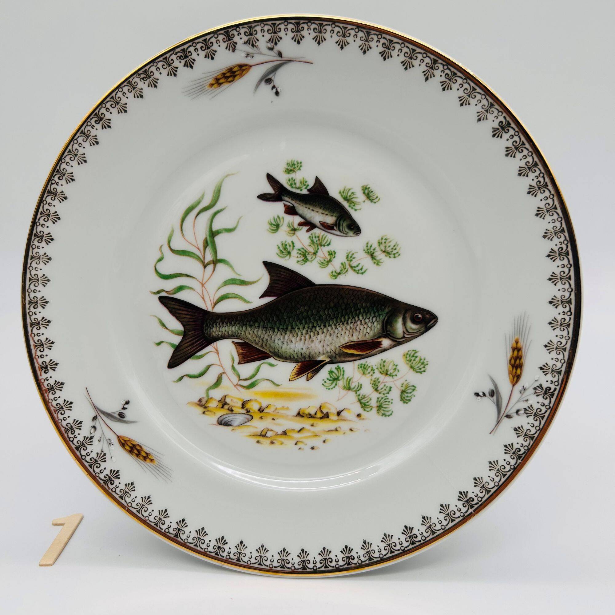 6 Limoges porcelain plates, fish pattern.