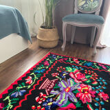 Vintage Romanian handwoven carpet with floral colorful design