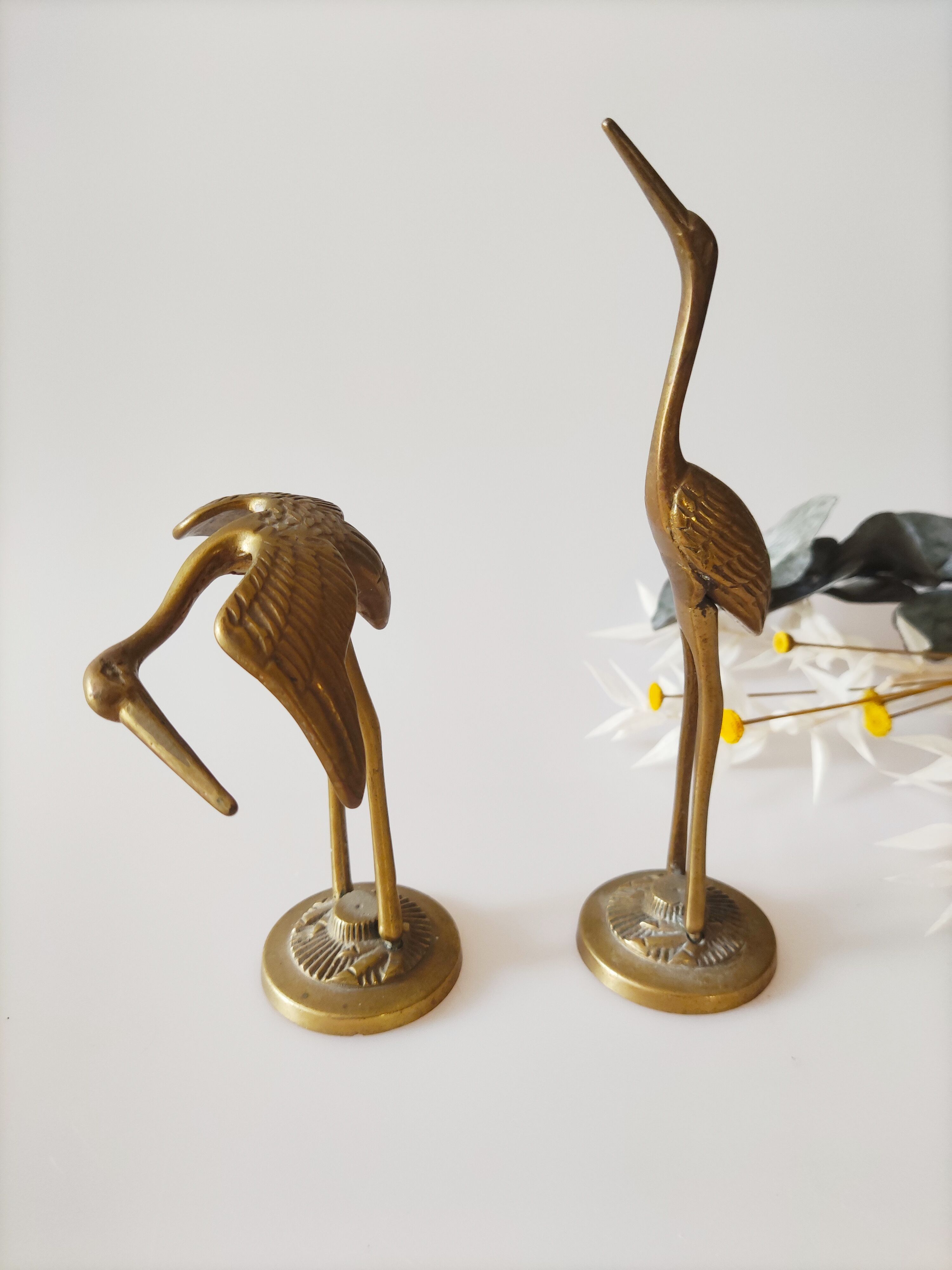 Brass heron duo