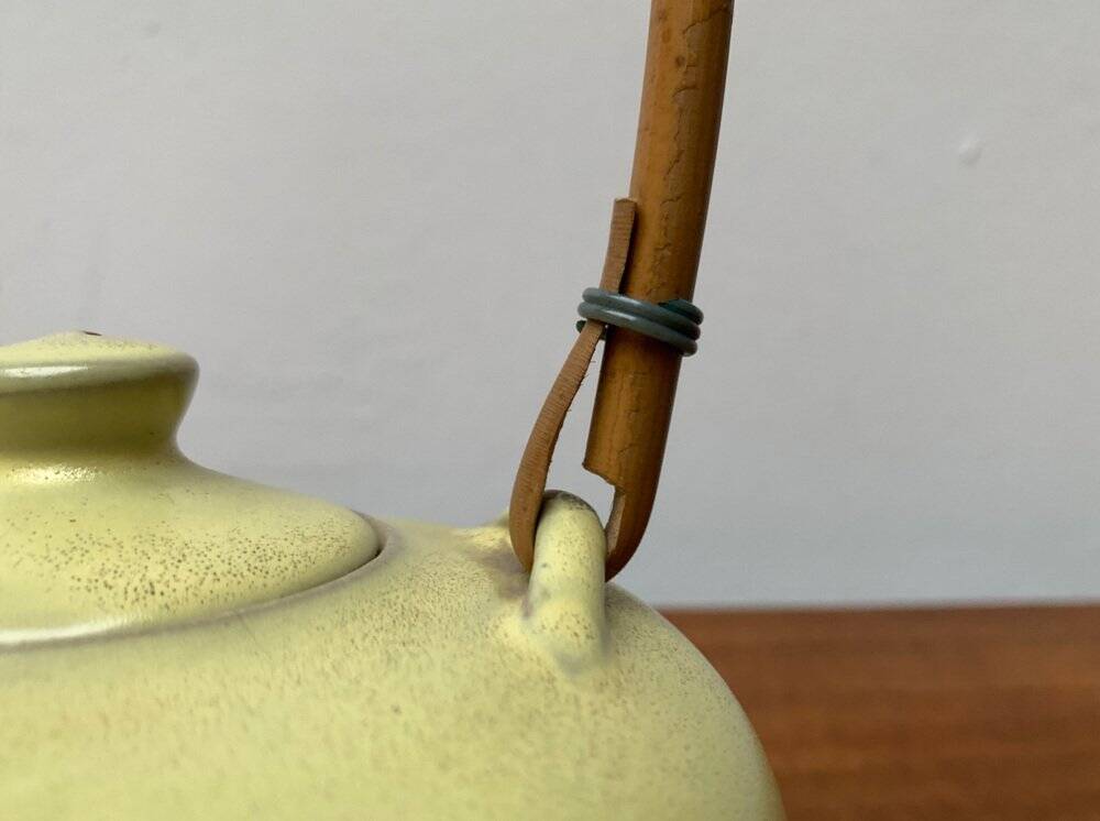 Mid-century ceramic teapot with bamboo handle, 1960s.