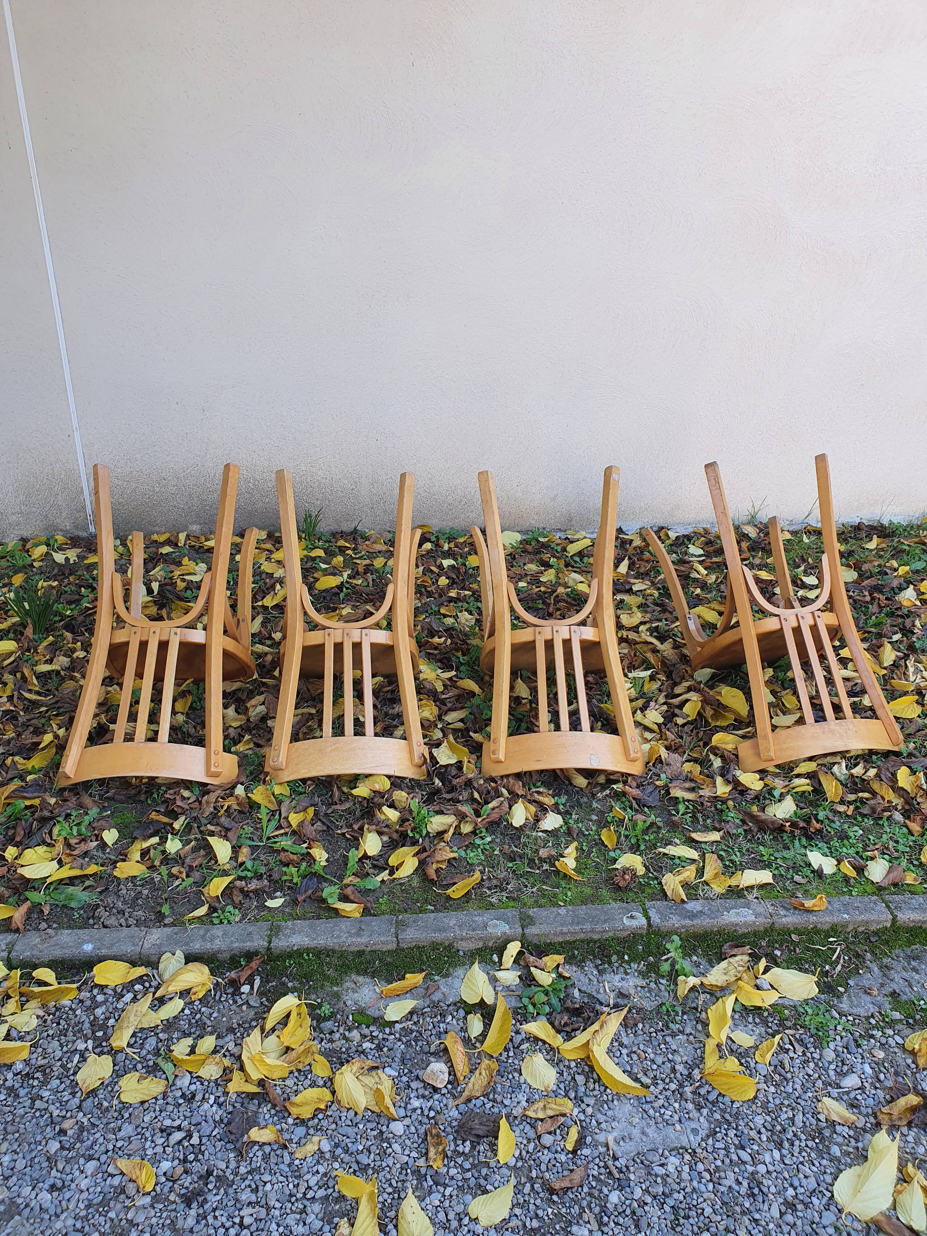 4 bistro chairs stamped Baumann