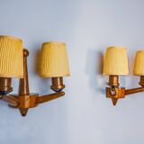 Pair of two-armed art deco "ball" wall lights, carved wood, France, 1960