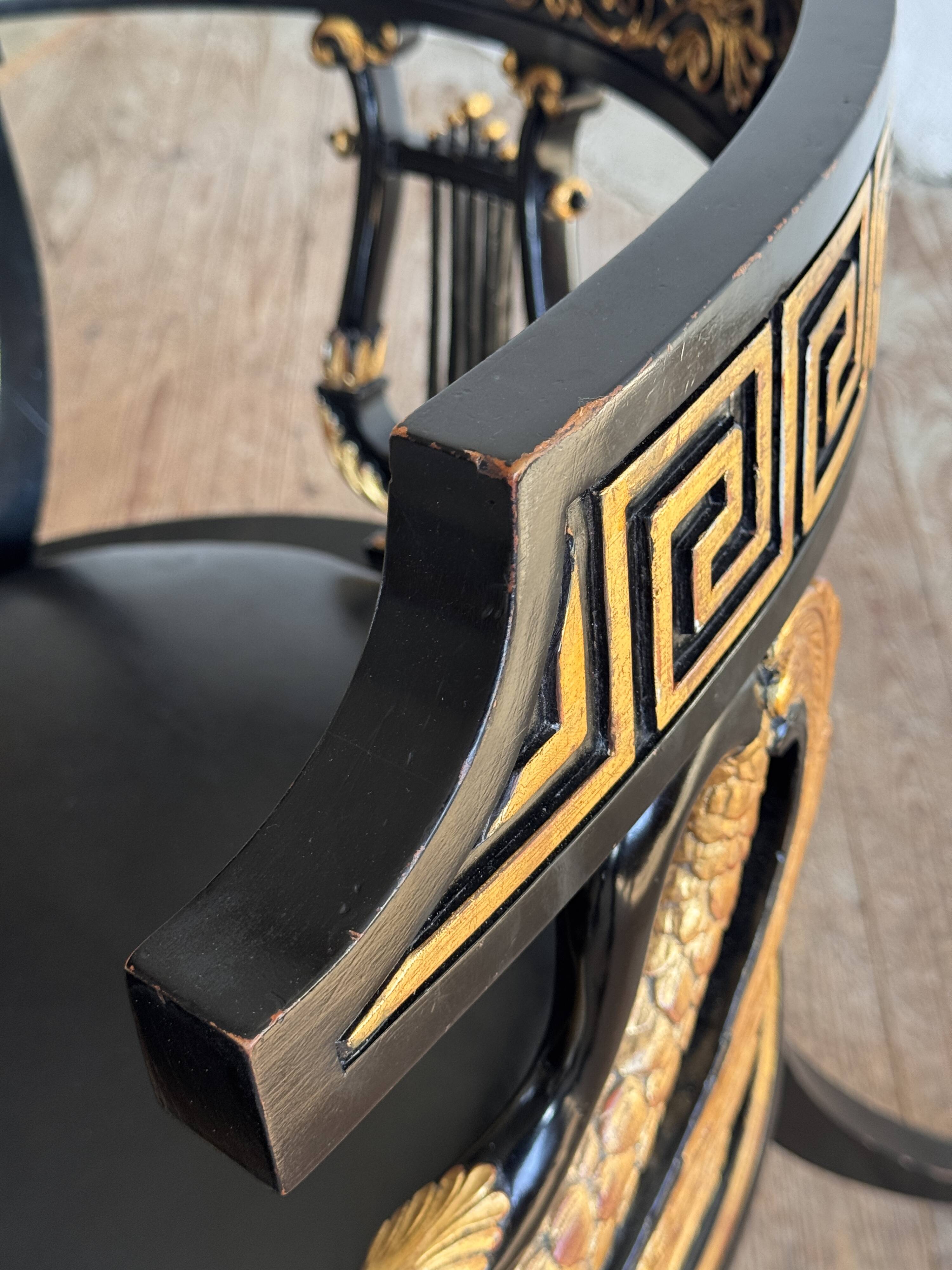 Pair of Empire-style bergère armchairs decorated with swans and lyres