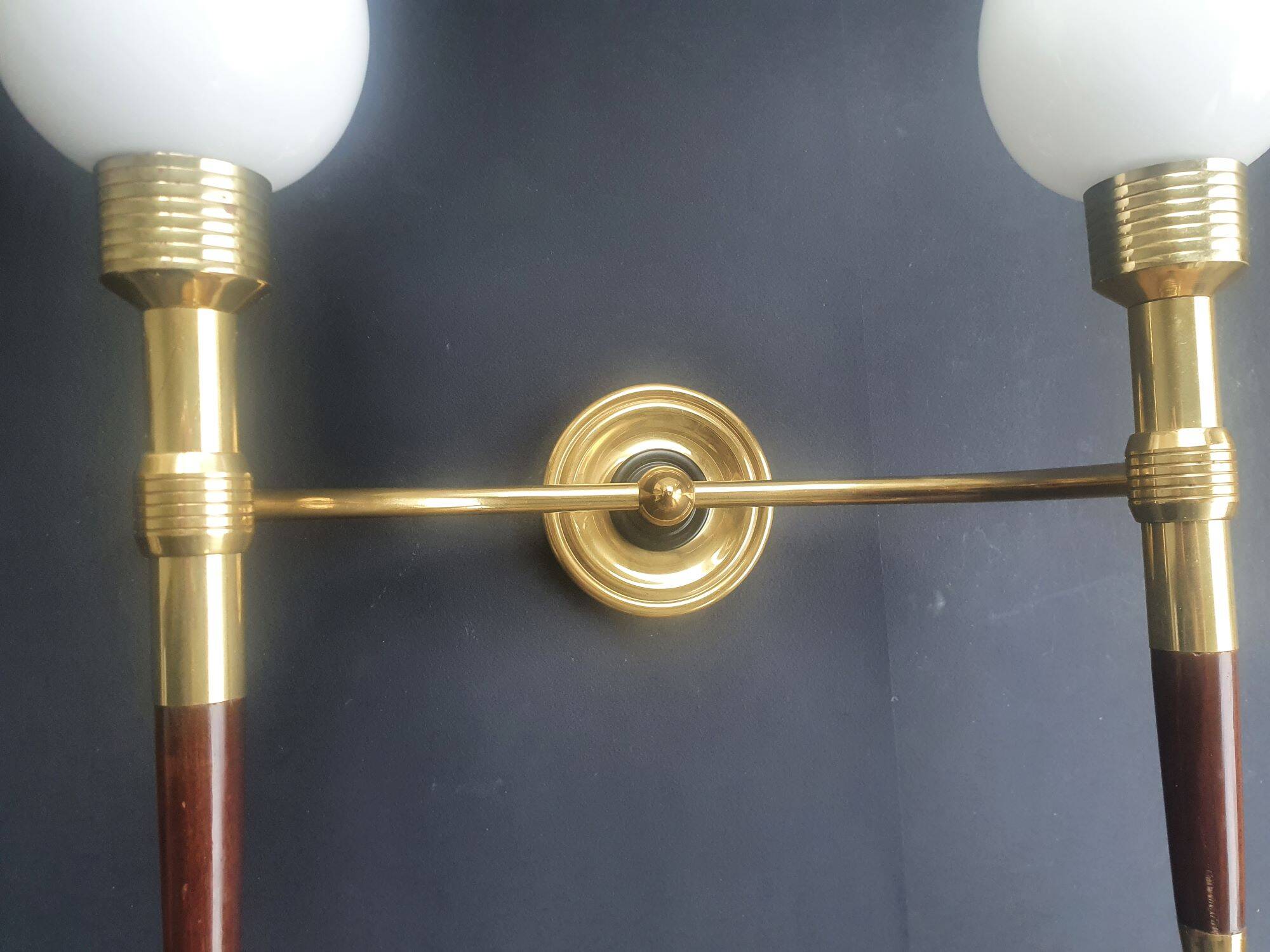 Large wall sconces torch style from the 1950s.