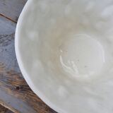 Important white earthenware pot cache with leafy decoration