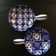Pair of blue decorated fondue pots