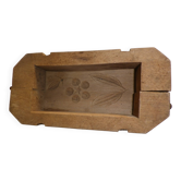 old wooden butter mold