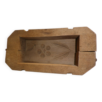 old wooden butter mold