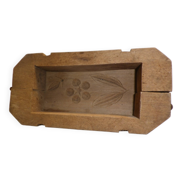 old wooden butter mold