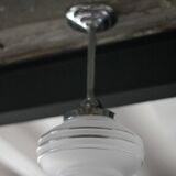 Art Deco pendant light, chrome metal suspension and glass globe, ceiling lamp.