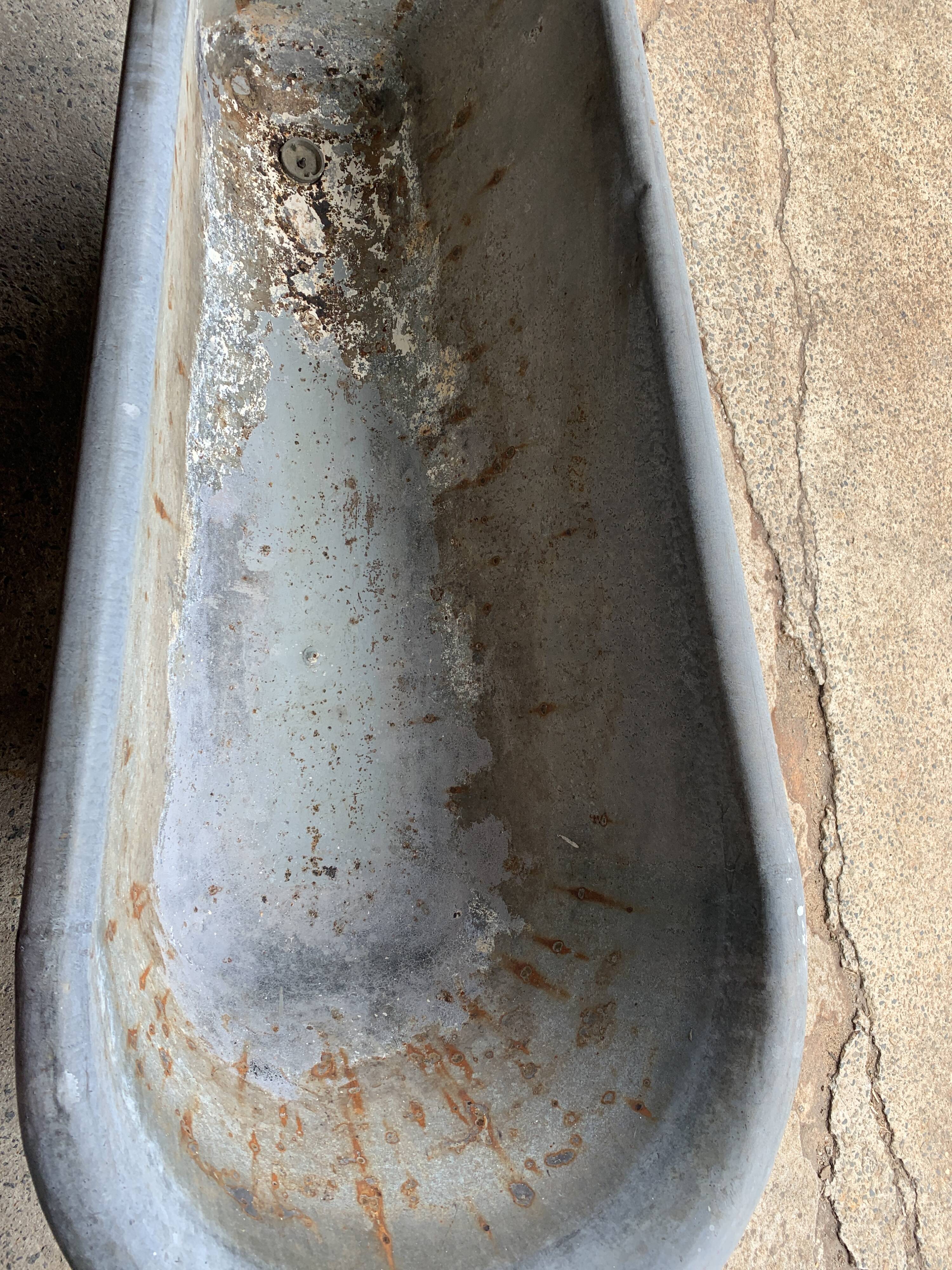 Ancient zinc bathtub