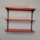 Tomado Holland - A. Dekker wall shelf, orange and black, 1970s