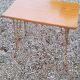 Sofa tip from the 60s in gold metal and formica