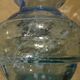 White speckled blue glass vase