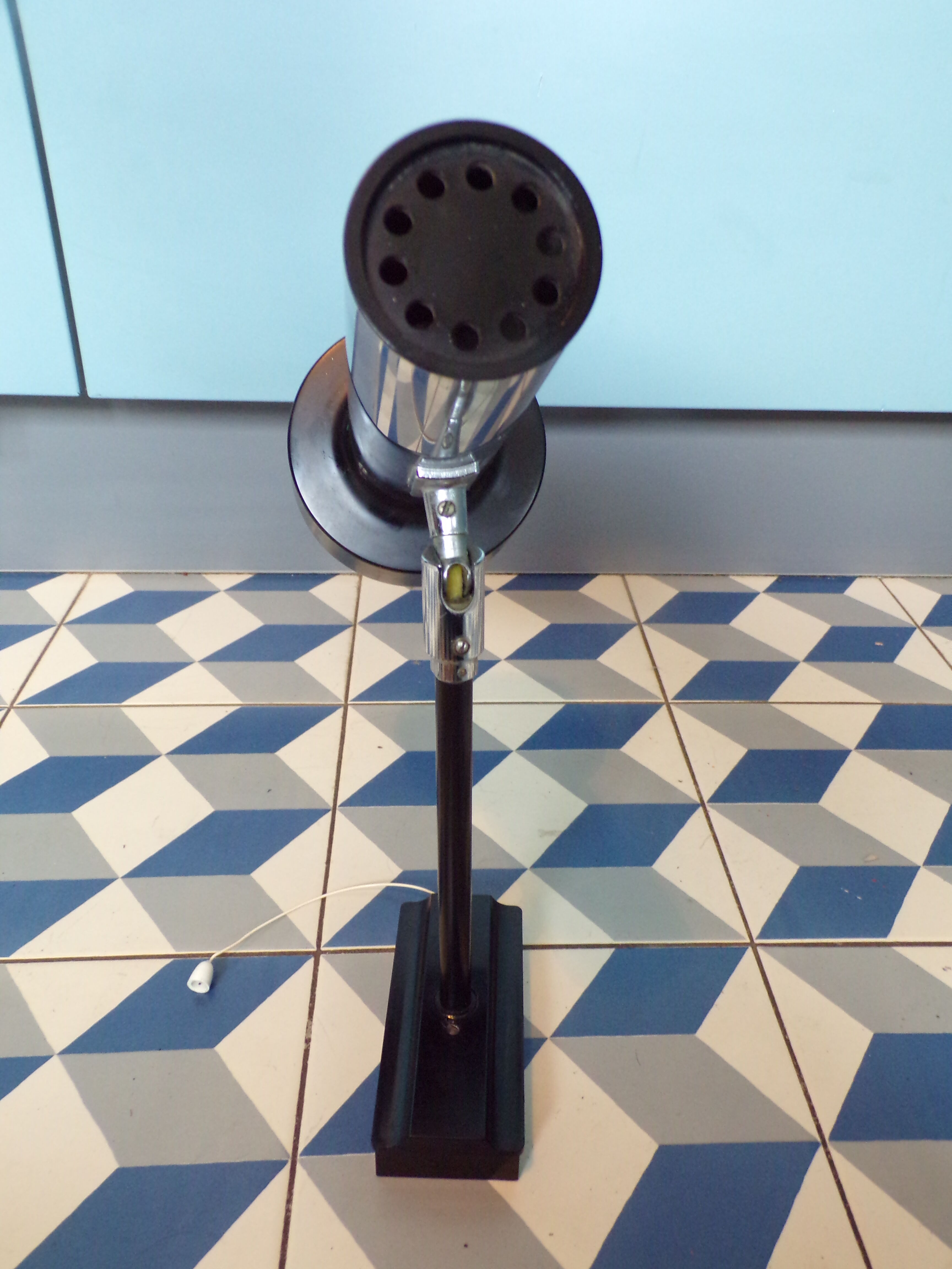 Space age articulated sconce