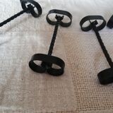 Set of 12 black twisted wrought iron knife holders from the 50s