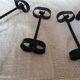 Set of 12 black twisted wrought iron knife holders from the 50s