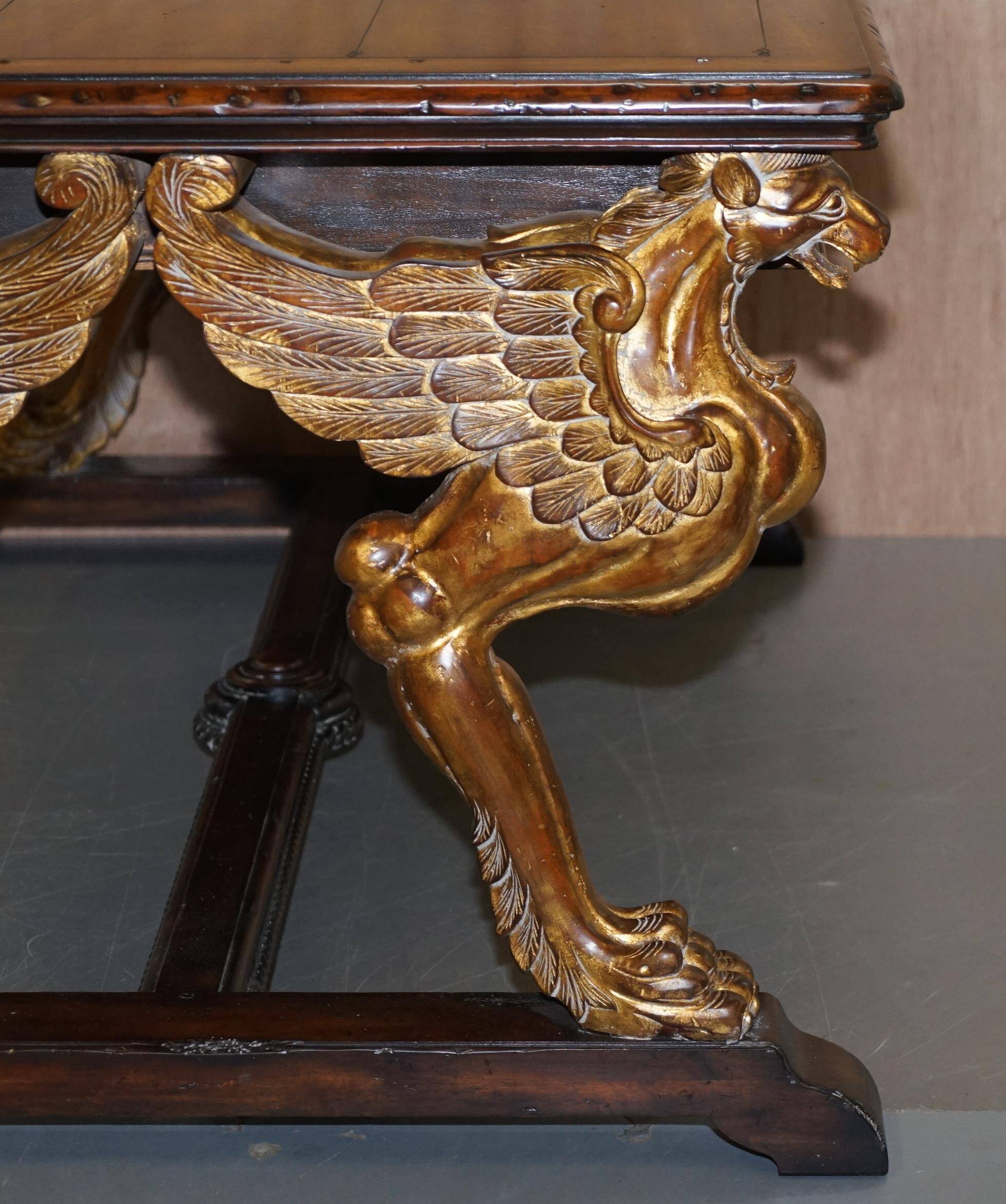 Double-sided writing desk in hardwood with gilt griffins, RJ Horner style.