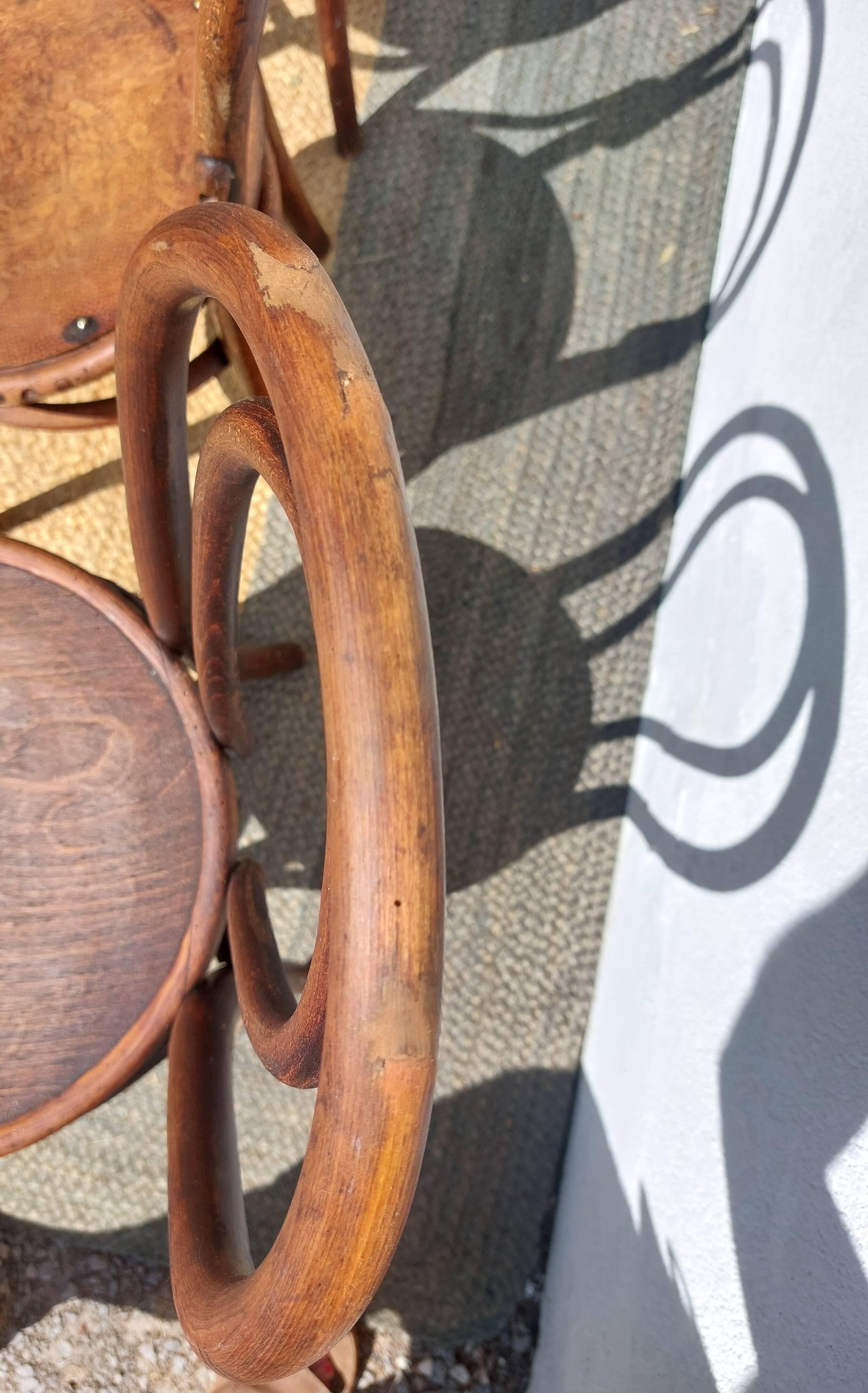 4 curved wooden bistro chairs