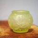 Fluorescent yellow ball vase with vine leaf patterns