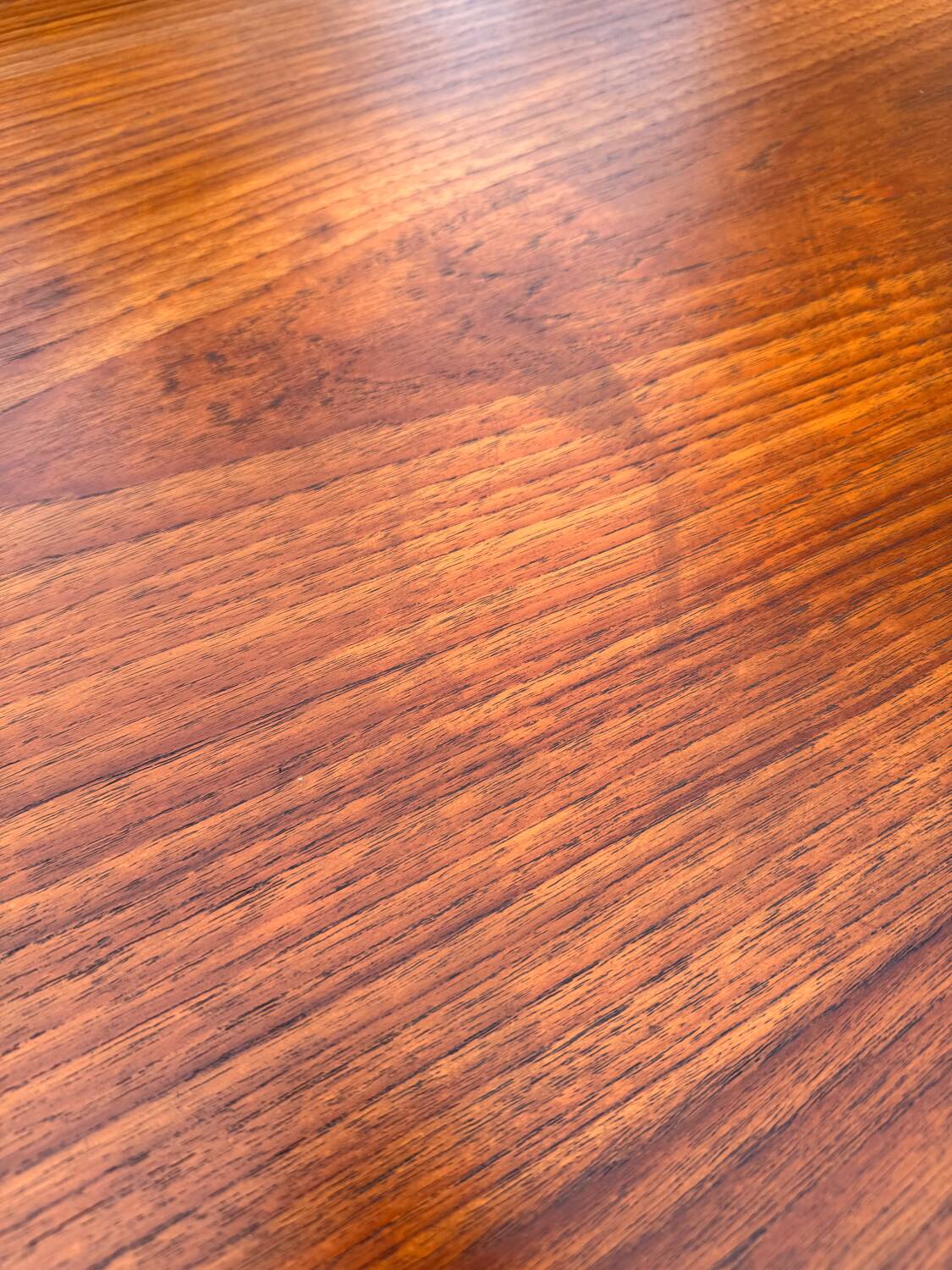 Scandinavian table in teak, design by Harry Ostergaard.