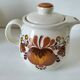 Brown floral patterned teapot from the 1970s.