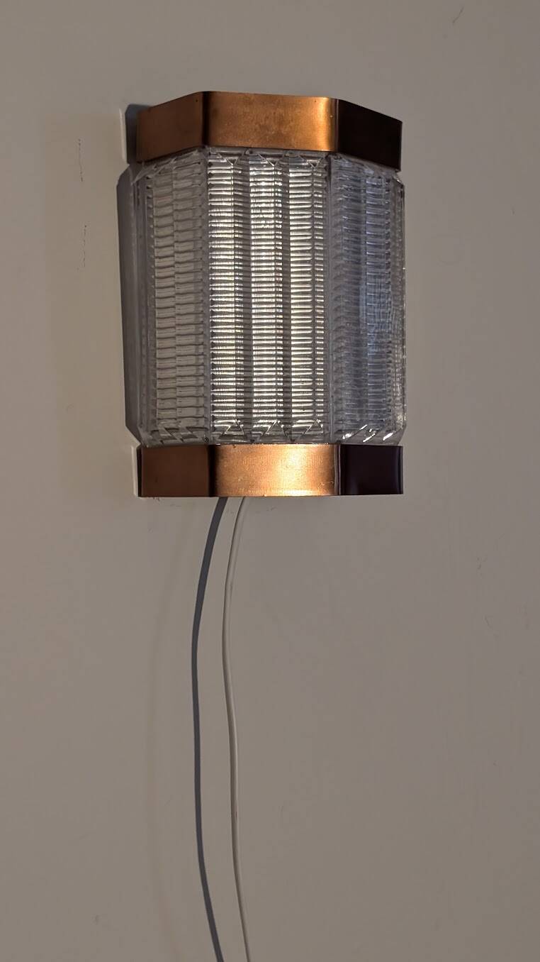 Scandinavian wall lights in copper and pressed glass