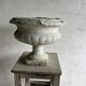 Pair of antique Médicis garden vases in cast stone.