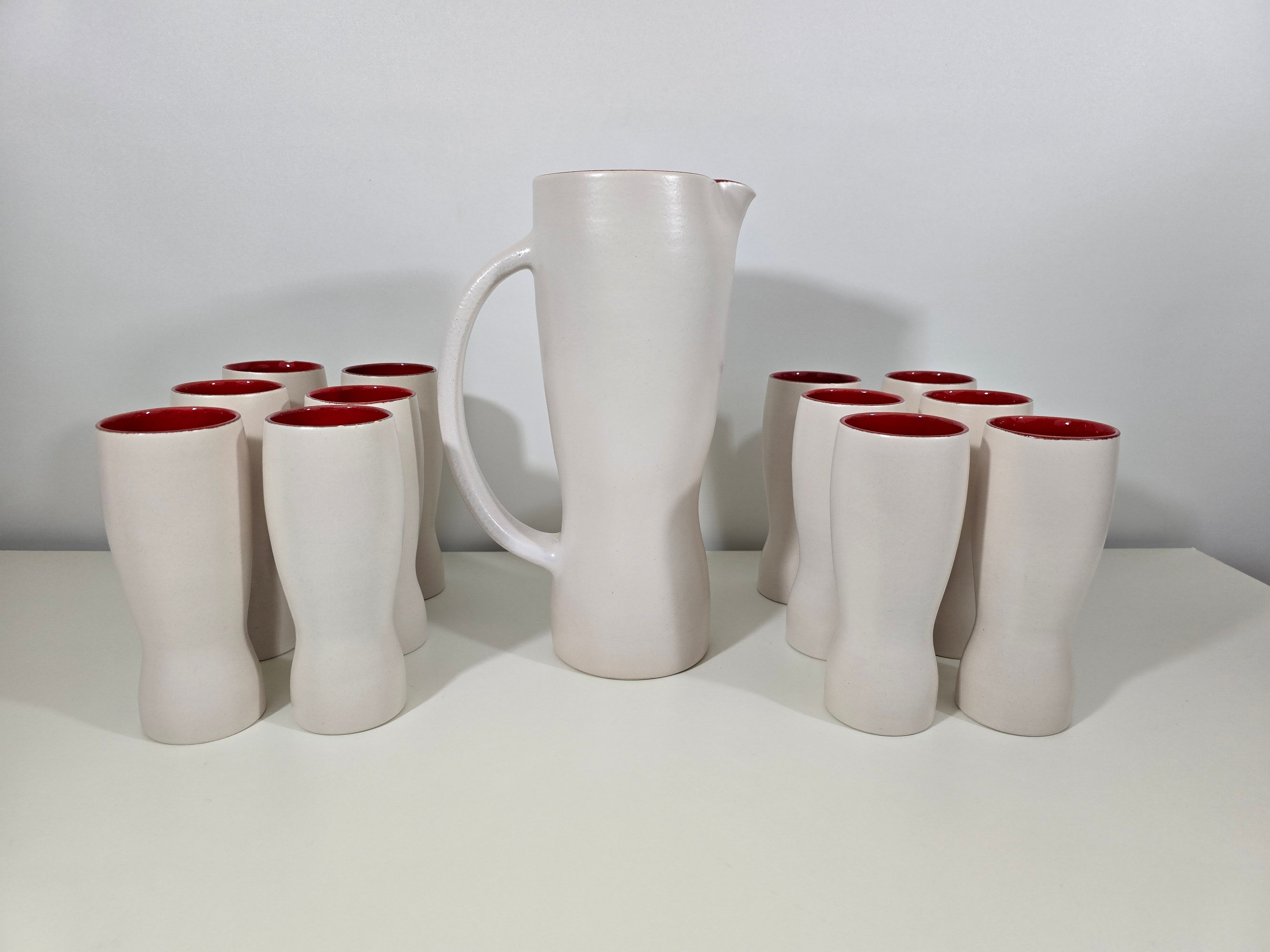 Jug and 12 ceramic cups model 1059 by Pol Chambost from around 1950.