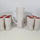 Jug and 12 ceramic cups model 1059 by Pol Chambost from around 1950.