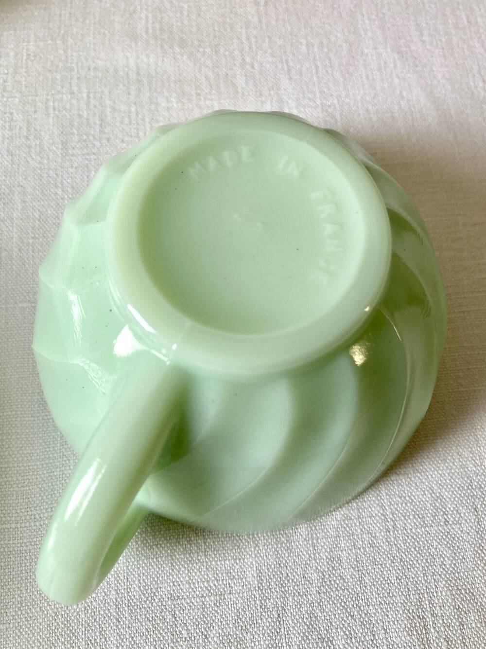 Pressed glass cups and saucers, 1950s