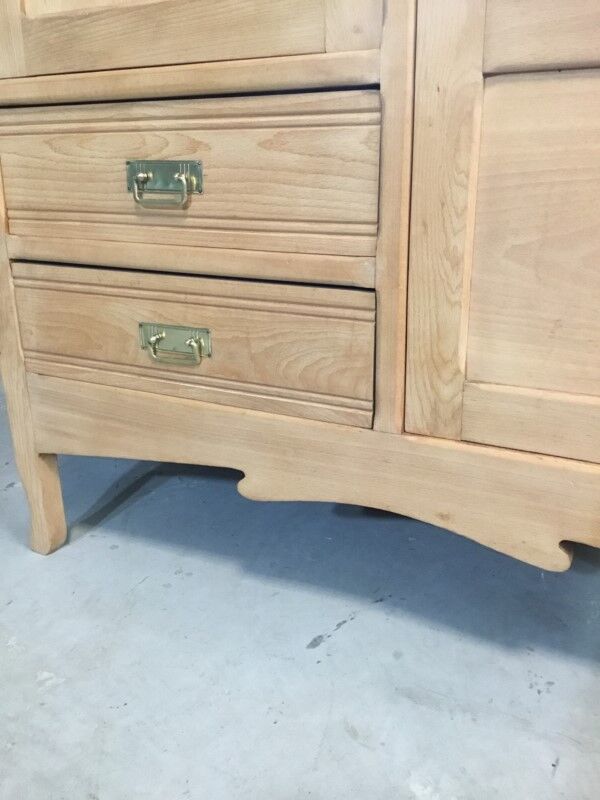 Raw wood hotel cabinet