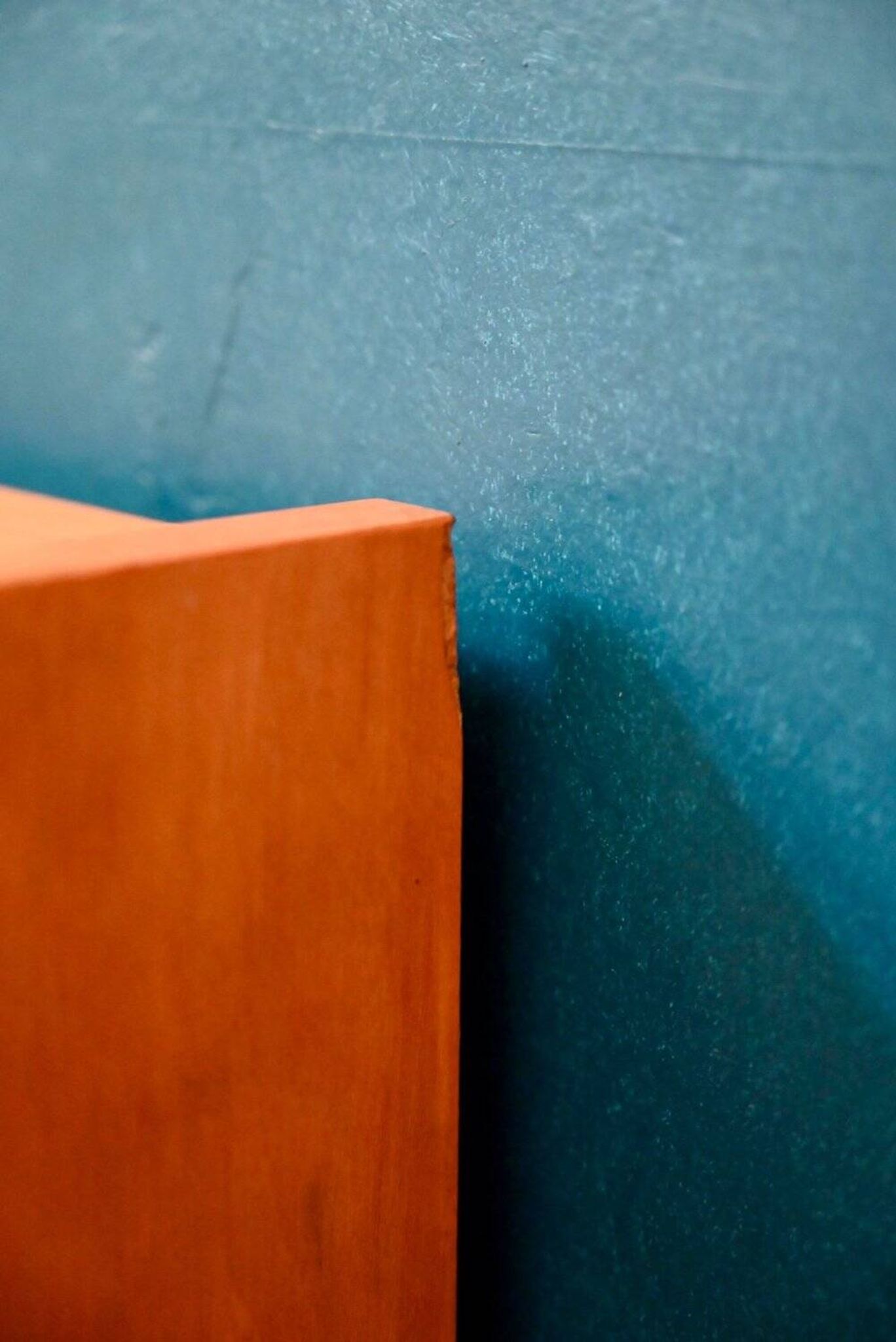 Rockabilly design bedside table with tapered legs.