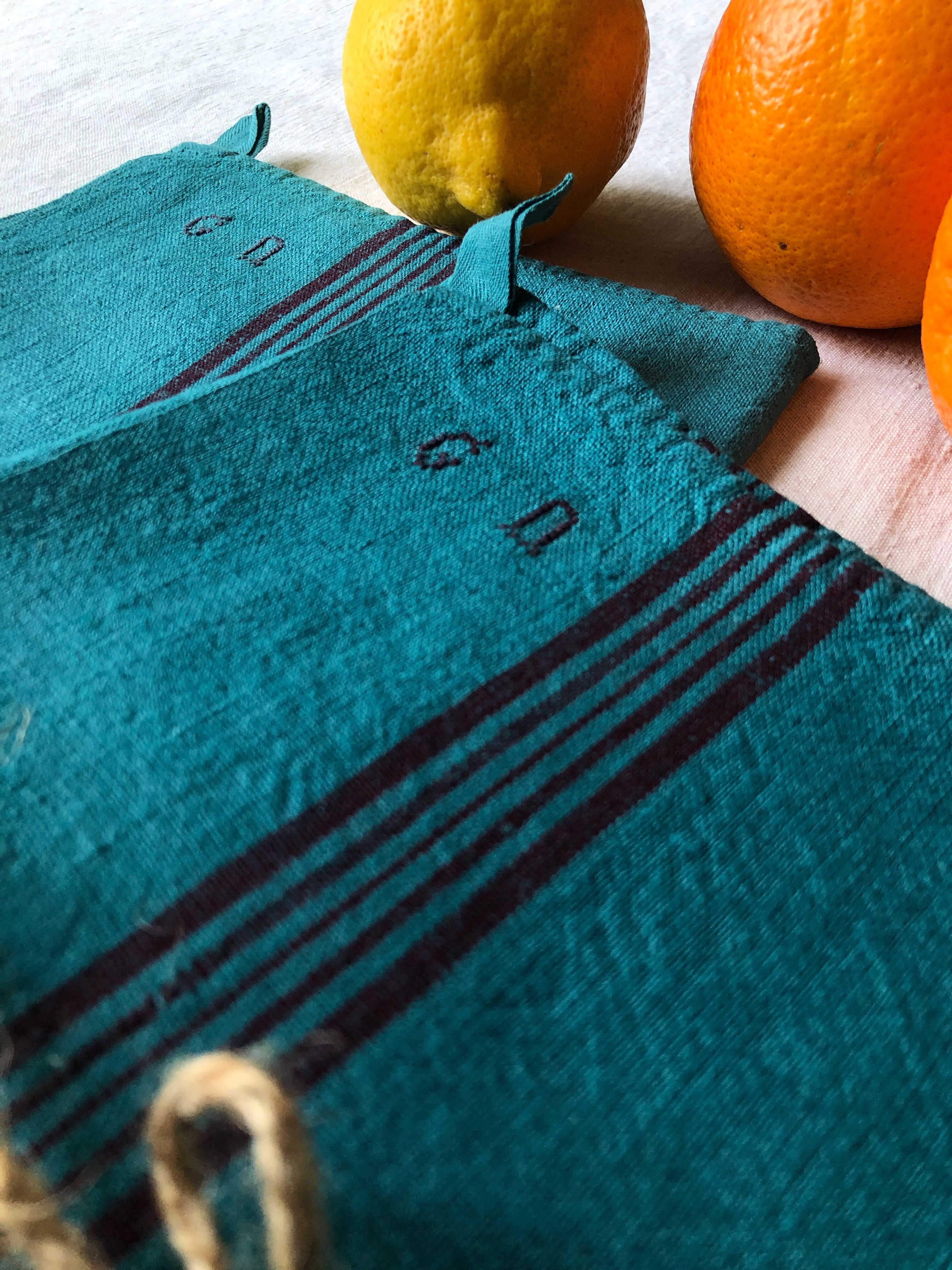 Antique clothes in linen and caribbean blue cotton