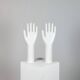 Pair of authentic vintage jewellery displays in industrial porcelain representing hands.