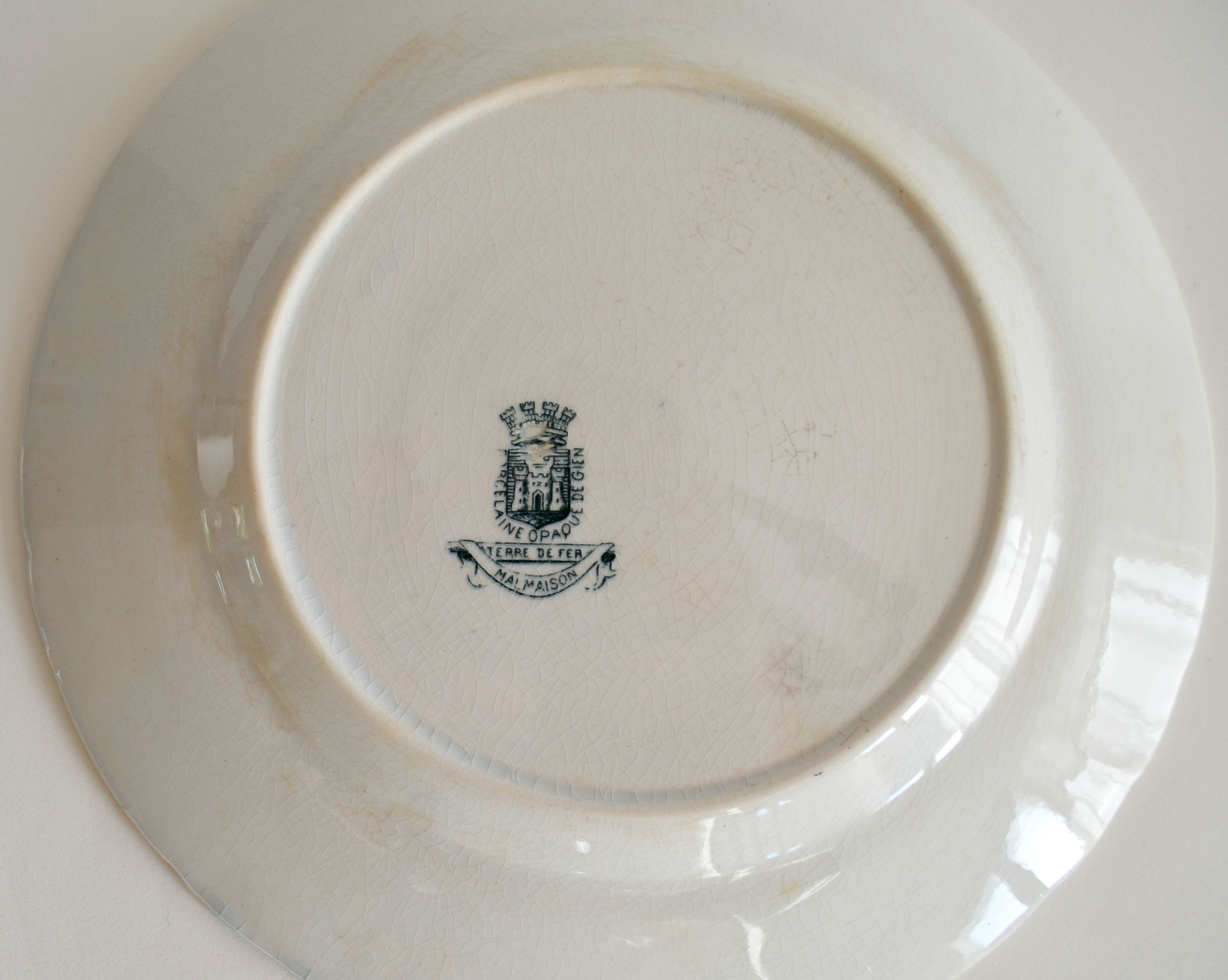 Two flat plates iron earth opaque porcelain by Gien Malmaison