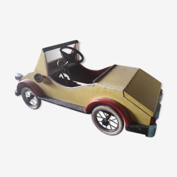 Children's pedal wooden car