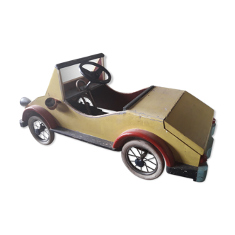 Children's pedal wooden car