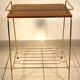 Side table - wooden and gold metal magazine rack
