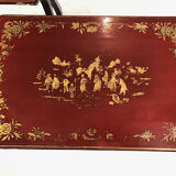 Series of three red lacquered nesting tables with gold decoration in Asian style, nineteenth