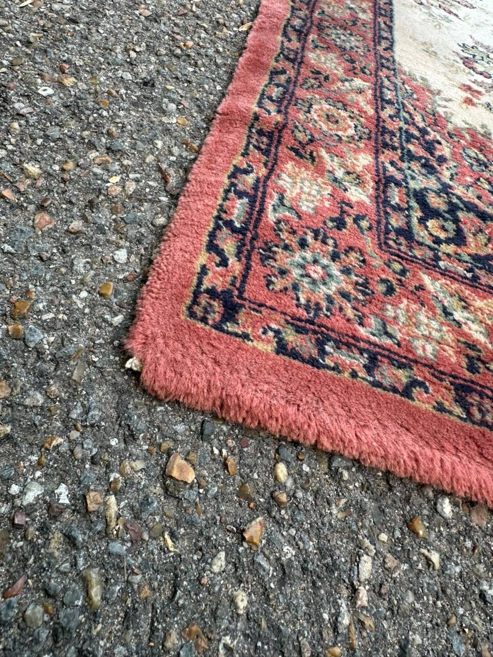 Vintage wool Persian rug with floral patterns 140x70 bedside rug.