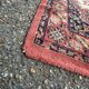 Vintage wool Persian rug with floral patterns 140x70 bedside rug.