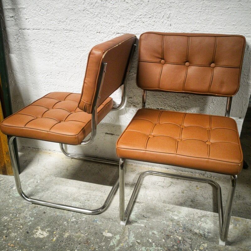 Pair of cantilever chrome and skaï chairs